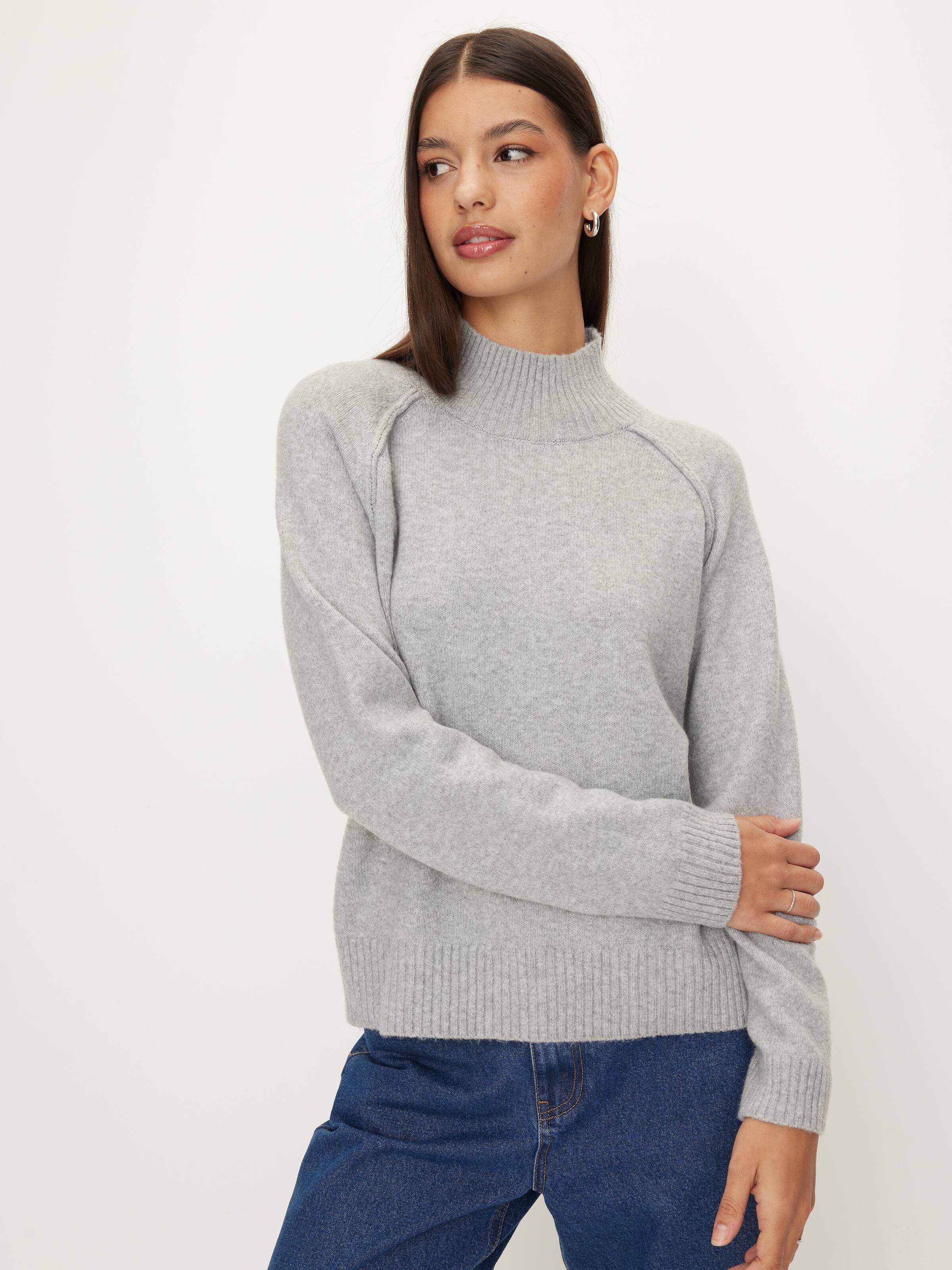 Exposed Seam Funnel Neck Knit