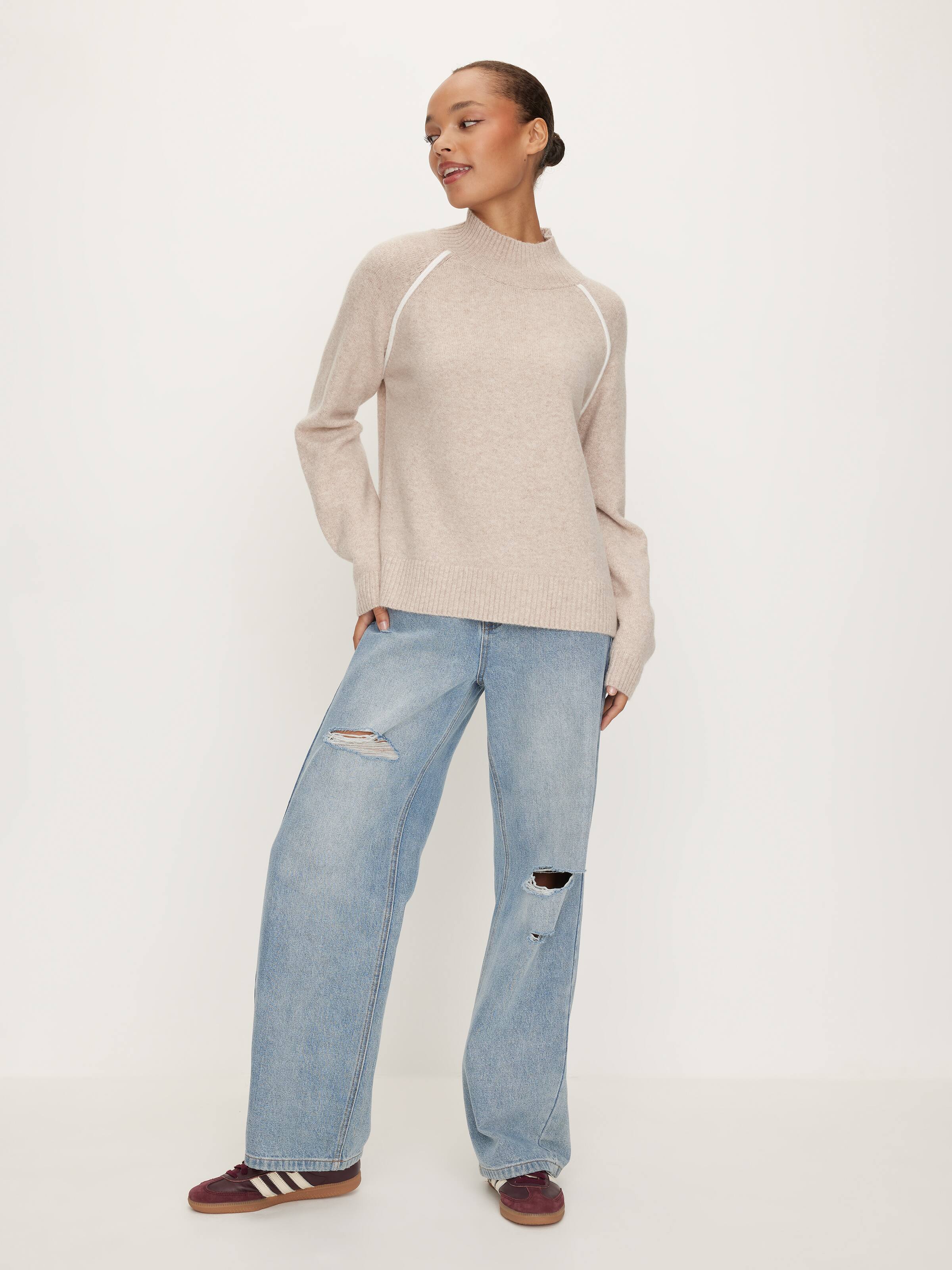 Exposed Seam Funnel Neck Knit