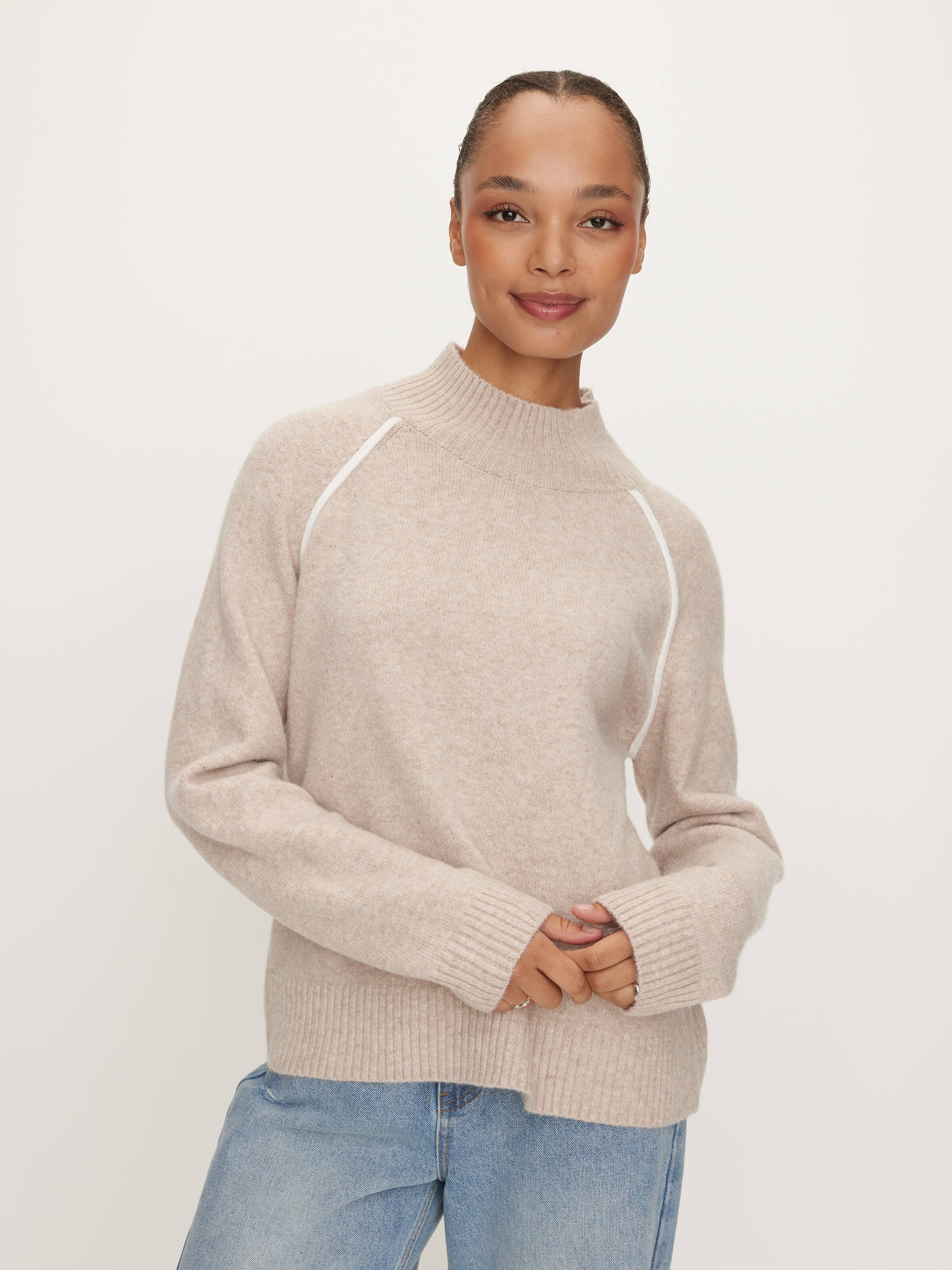 Exposed Seam Funnel Neck Knit