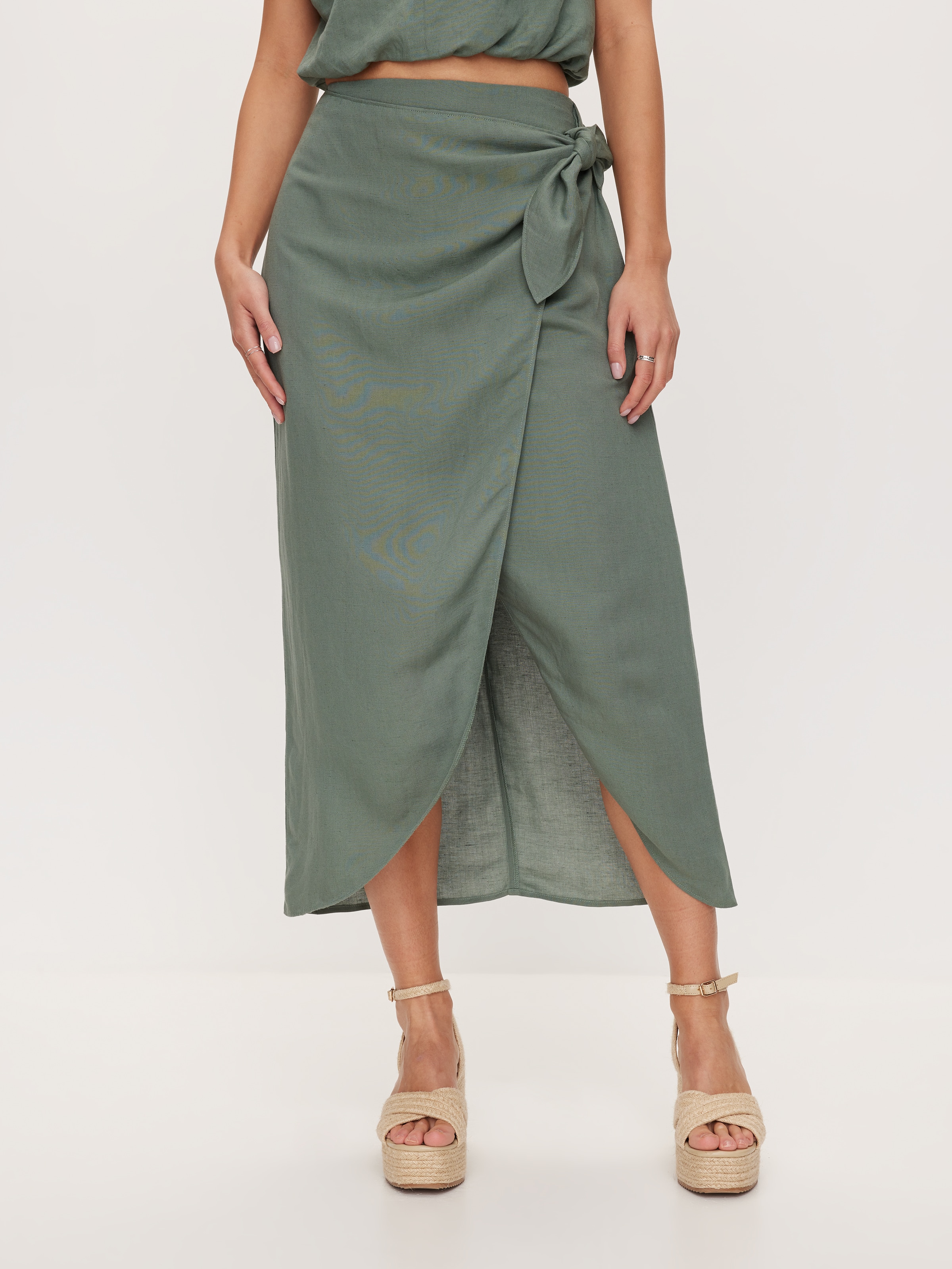 Green skirt dotti 2025