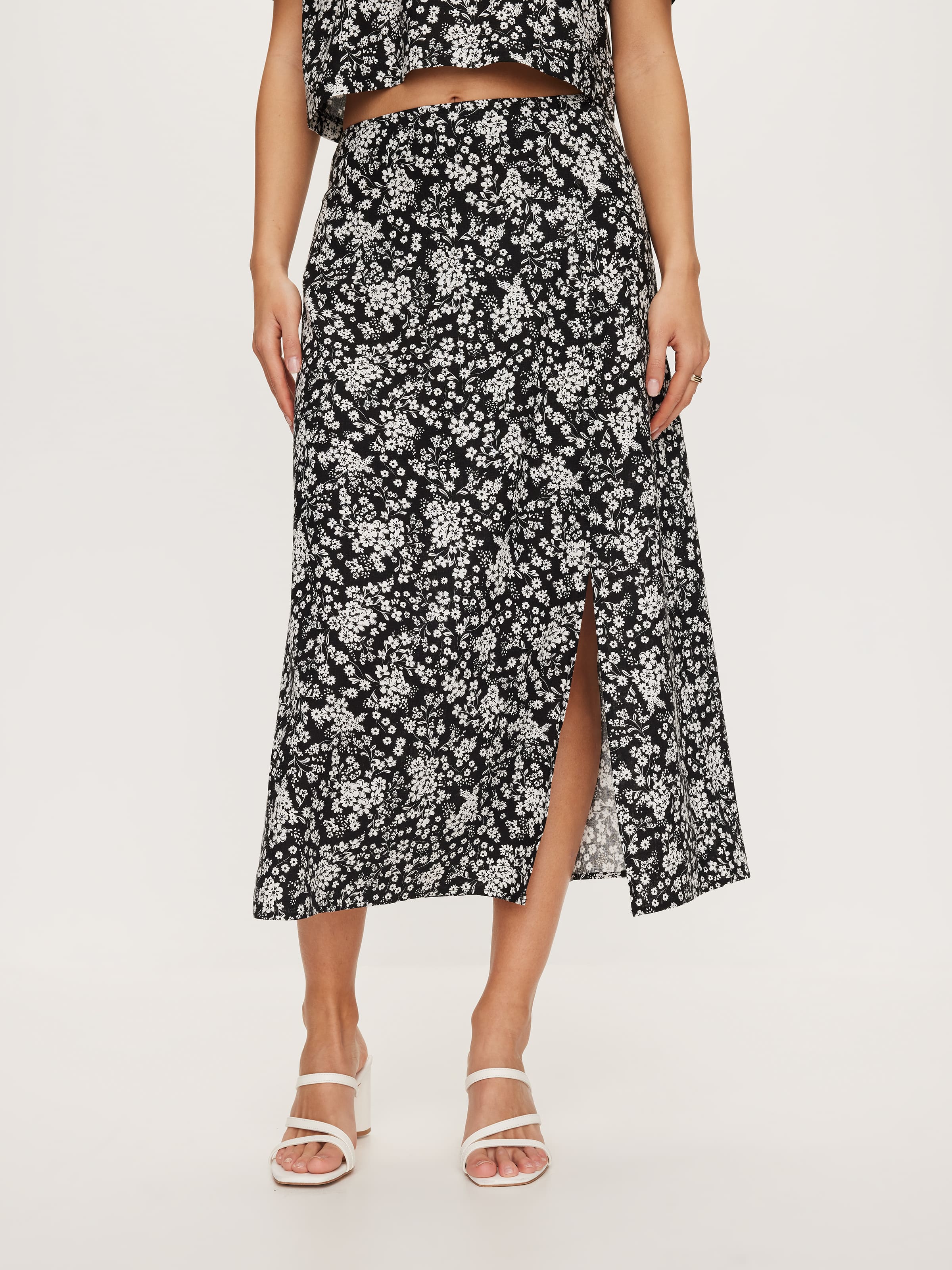 lllNew vacay Black ditzy floral midi skirt high waist front split . L